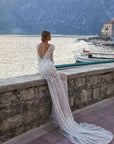 Halbtransparent Brautkleid mit lange Ärmel von Milla Nova